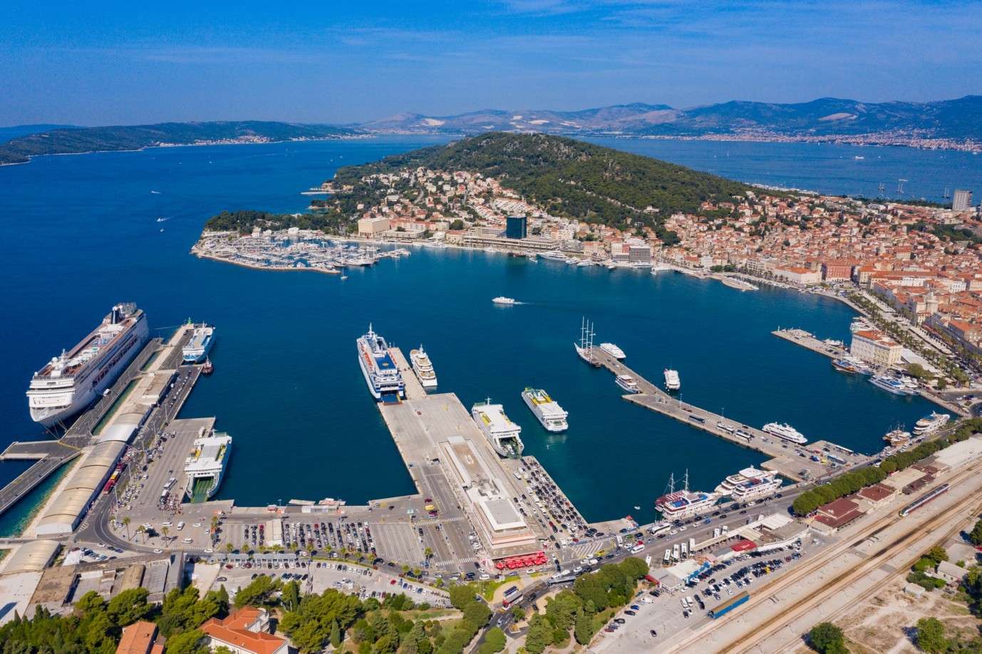Aerial view of Split harbour with ferries at the quay and the old city behind